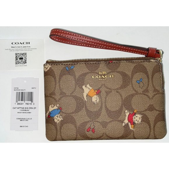 Coach Bags Coach Corner Zip Wristlet In Signature Canvas With Cat